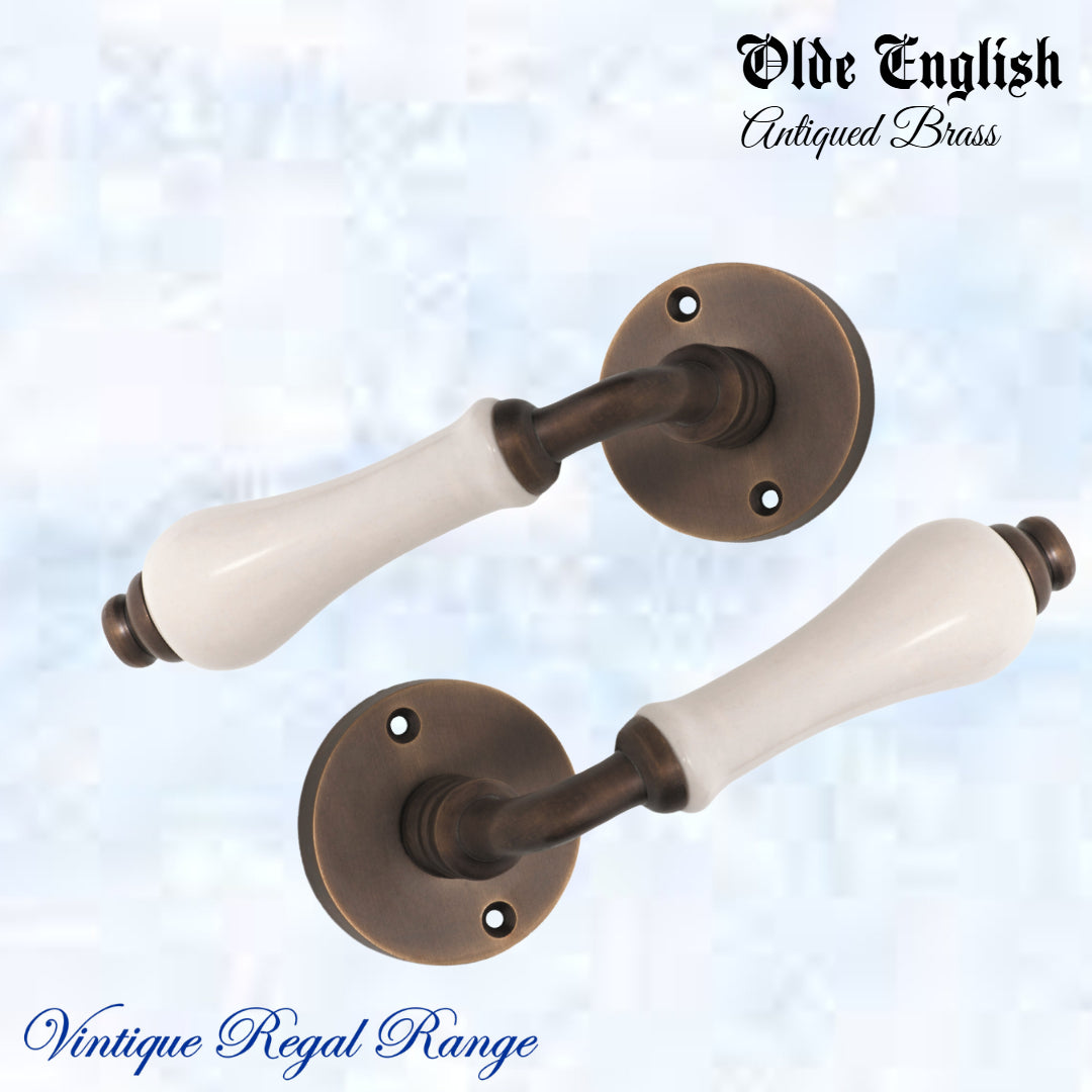 Antiqued Brass Olde English with Ivory Porcelain lever door handle-Vintique Concepts