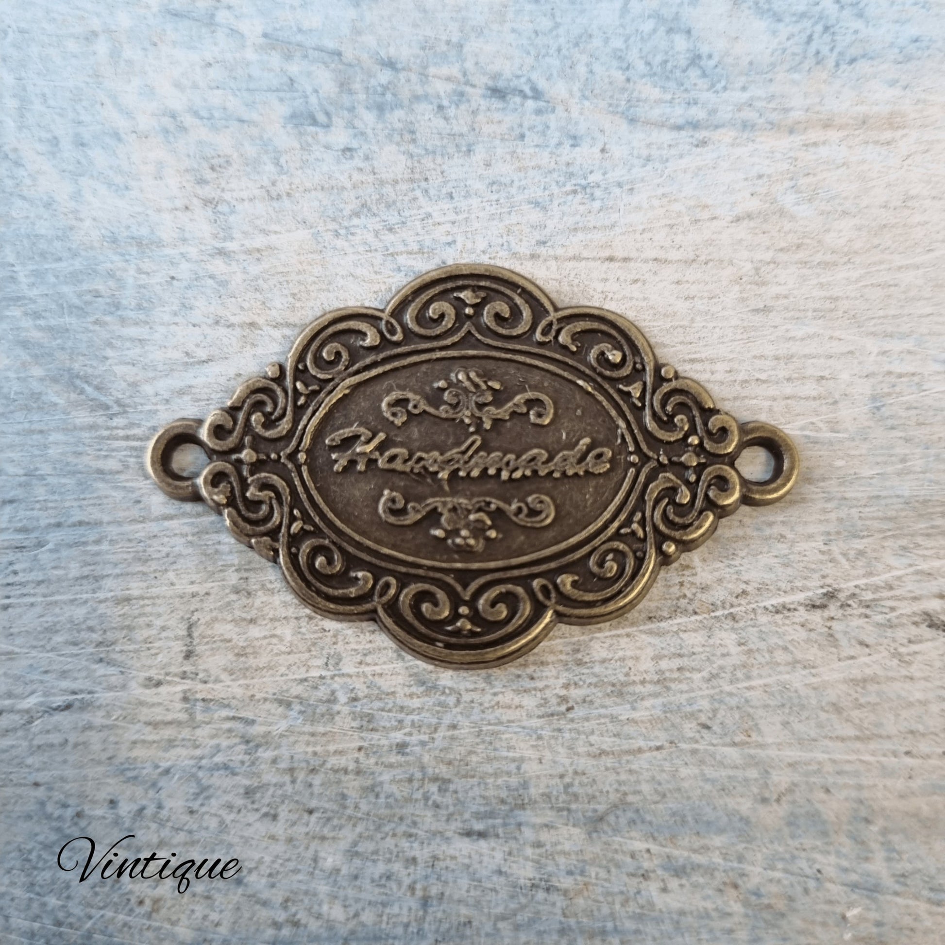 Antique "handmade"tag Bronze 42mm x 26mm-Vintique Concepts