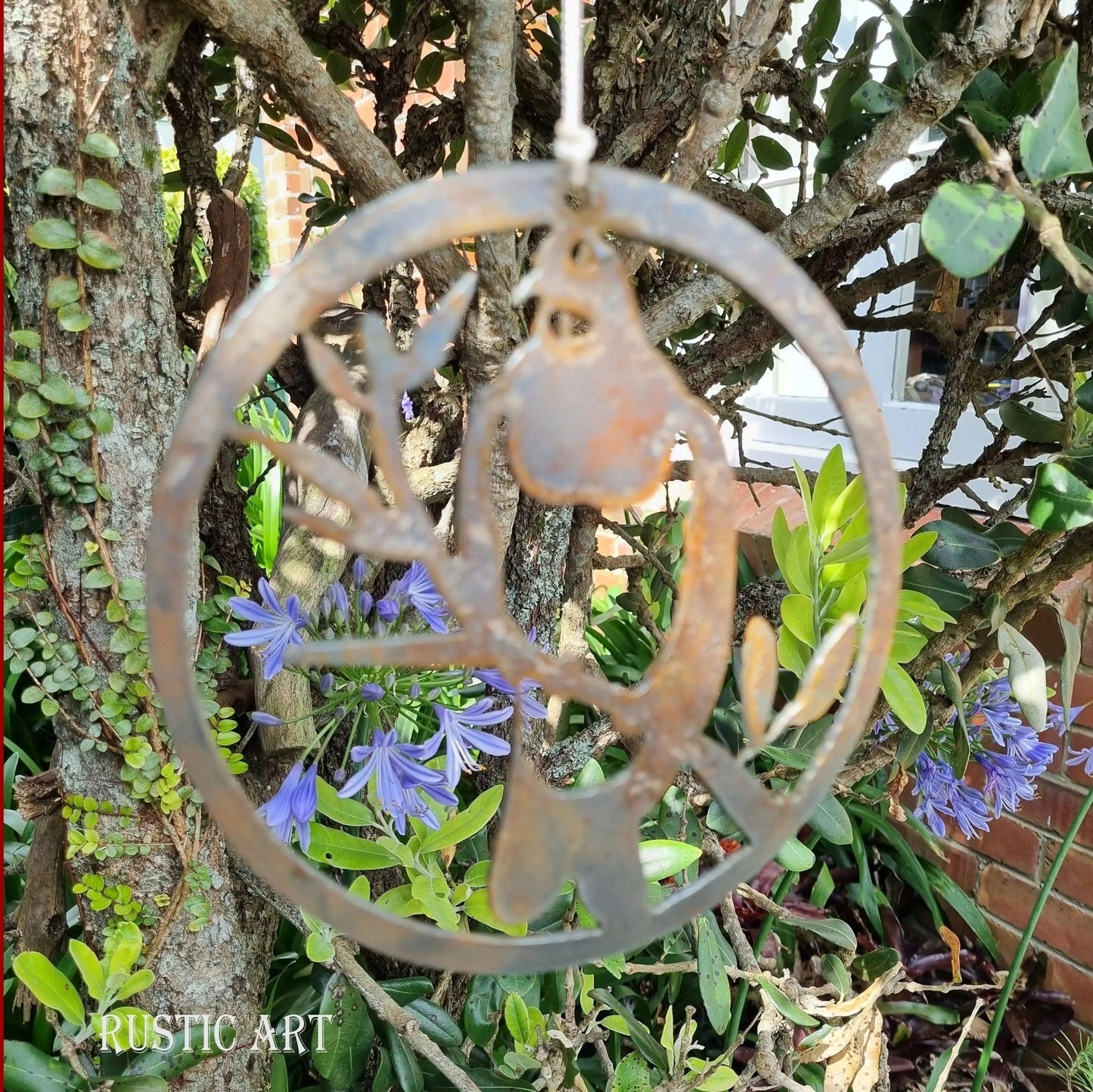 Hanging Rusty Metal Bird KERERU in  circle approx 180mm in dia-Vintique Concepts