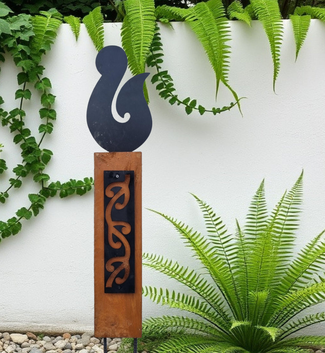 Black metal NZ Hei Matau (Fish Hook) on Rustic Oak Post-Garden Art-Vintique Concepts