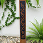 Black metal Long Koru pattern on Rustic Oak Post-Garden Art-Vintique Concepts