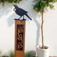 Black metal NZTui (song bird) on Rustic Oak Post-Garden Art-Vintique Concepts