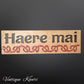 Carved wooden Kauri sign "Haere Mai"665mm x 195mm-Vintique Concepts