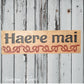 Carved wooden Kauri sign "Haere Mai"665mm x 195mm-Vintique Concepts